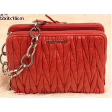 Miu Miu Borsa a tracolla mini in pelle matelassé smaltata arancione