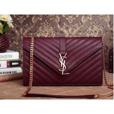 Borsa a mano media YSL Monogram in pelle matelassé nera e magenta con texture Poudre