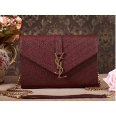 Borsa a mano piccola YSL Monogram in pelle matelassé con texture grana magenta scuro