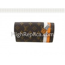 Portafoglio Louis Vuitton Monogram Groom con tasca con cerniera arancione